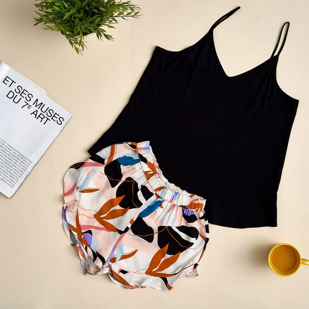 Women summer pajama set Black top + Ruffles orange leaves shorts - Image 2