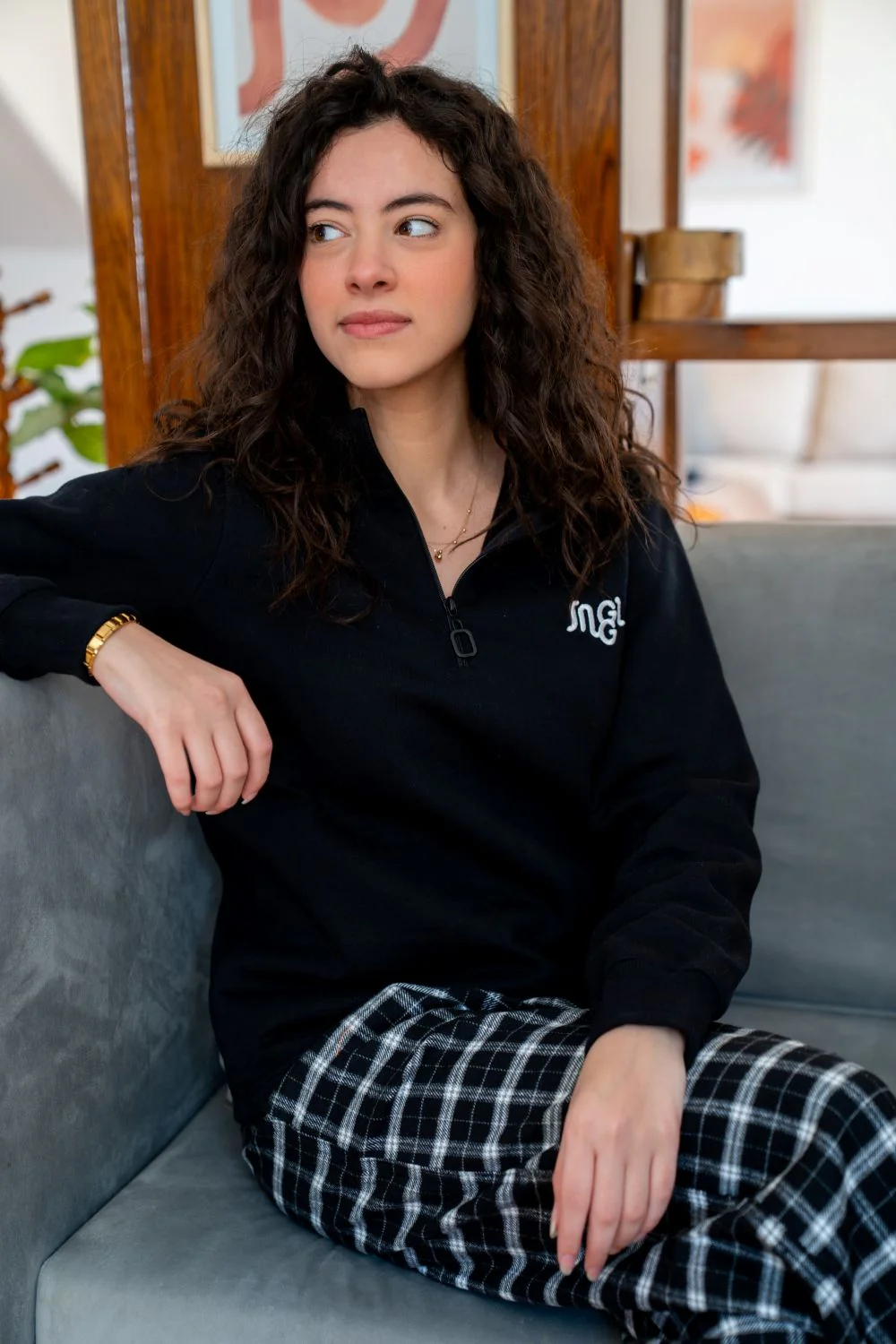 Women Winter Pajama Set Black sweatshirt + Black X White Checkered Pants - Image 2